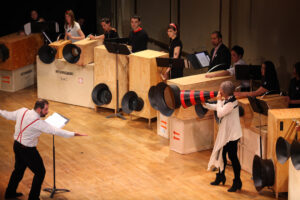 Luciano-Chessa-Conducting-Joan-La-Barbara-and-The-Orchestra-of-Futurist-Noise-Intoners-A-Performa-Commission-at-Town-Hall-in-New-York-City-2009-Photo-by-Paula-Court-Courtesy-of-Performa-1